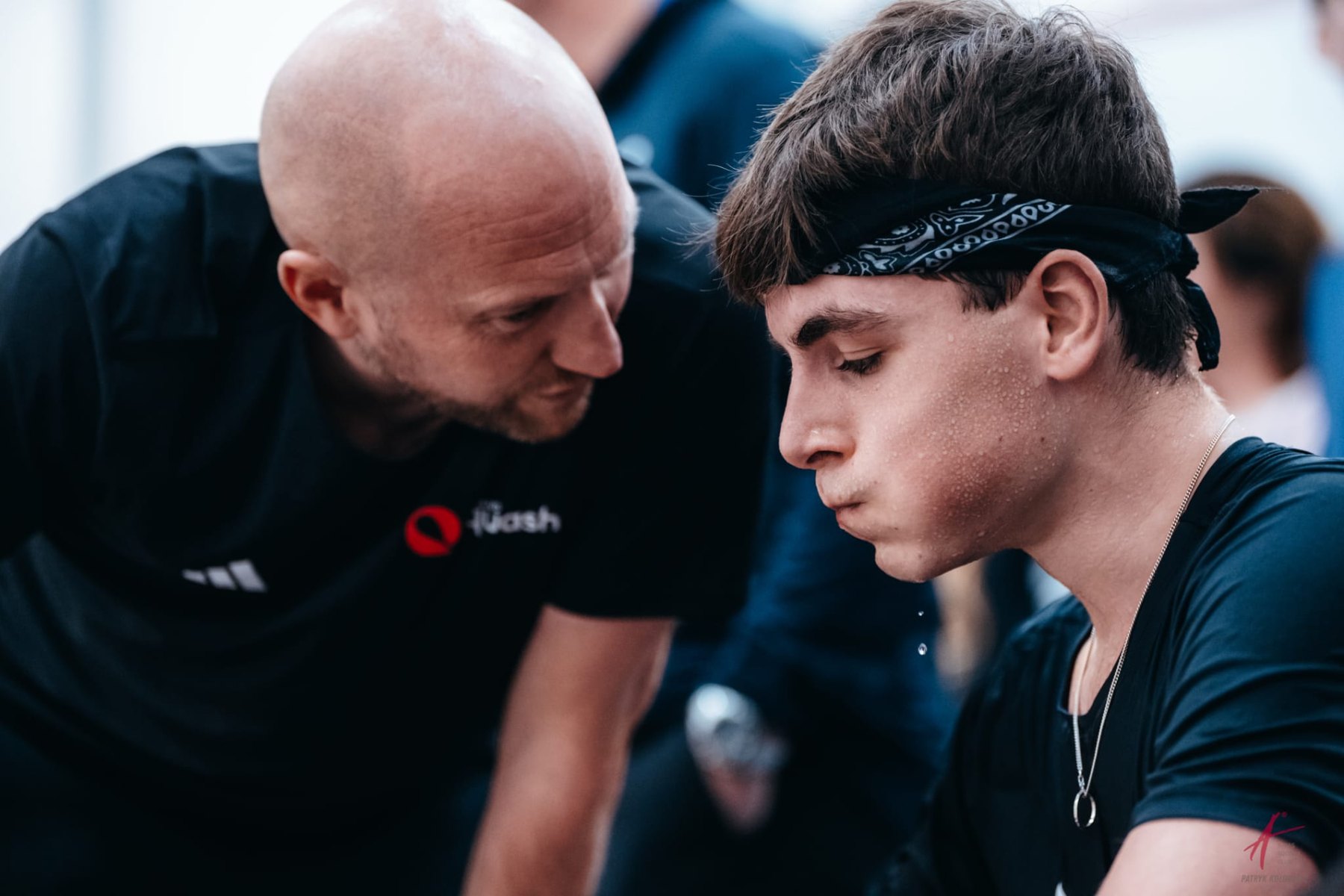 Tim Veil coaching an England junior between games